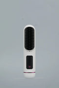 Portable negative ion hair straightening comb in blue, grey, or white.