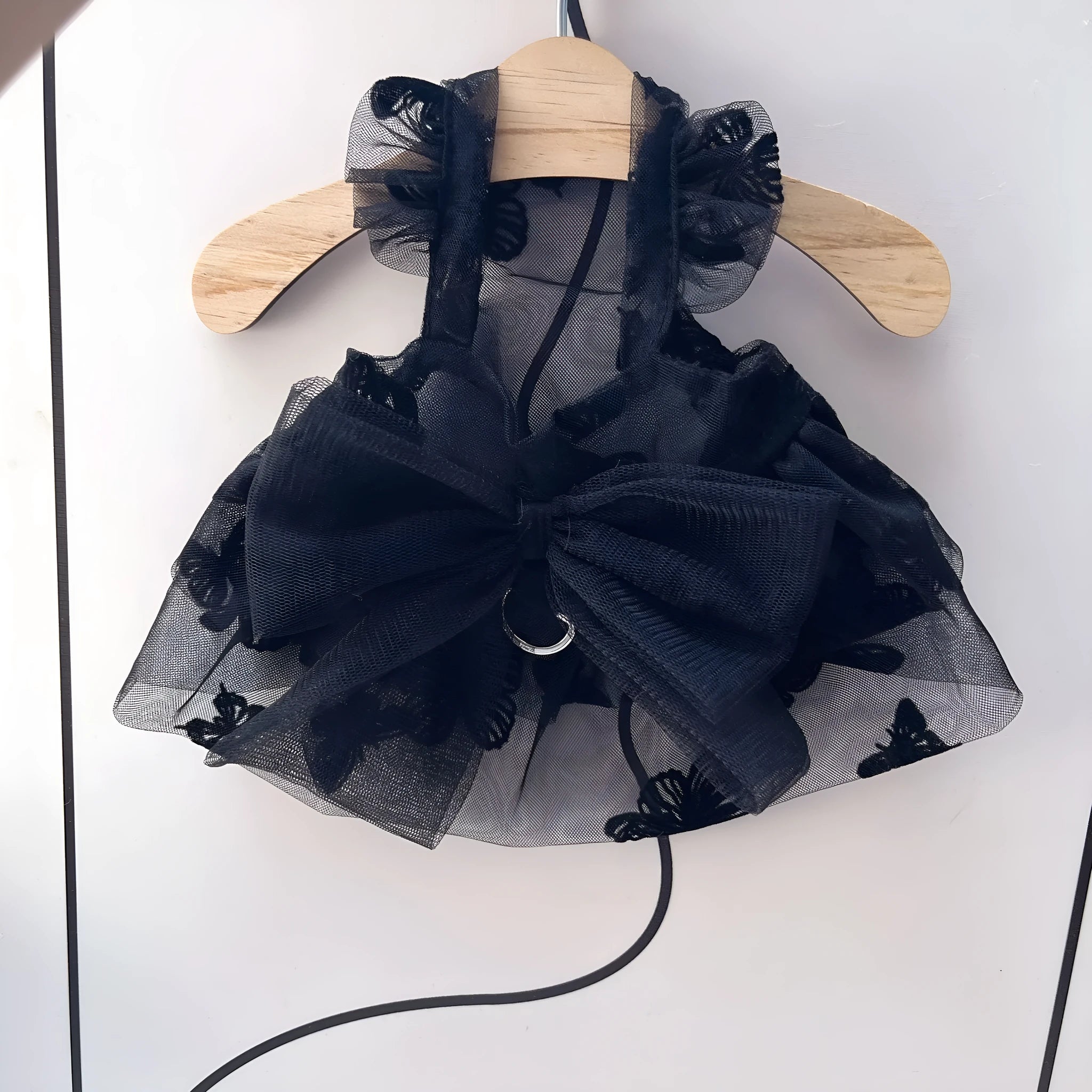 Black gauze tulle princess skirt on a small dog, showing layered design and fit.