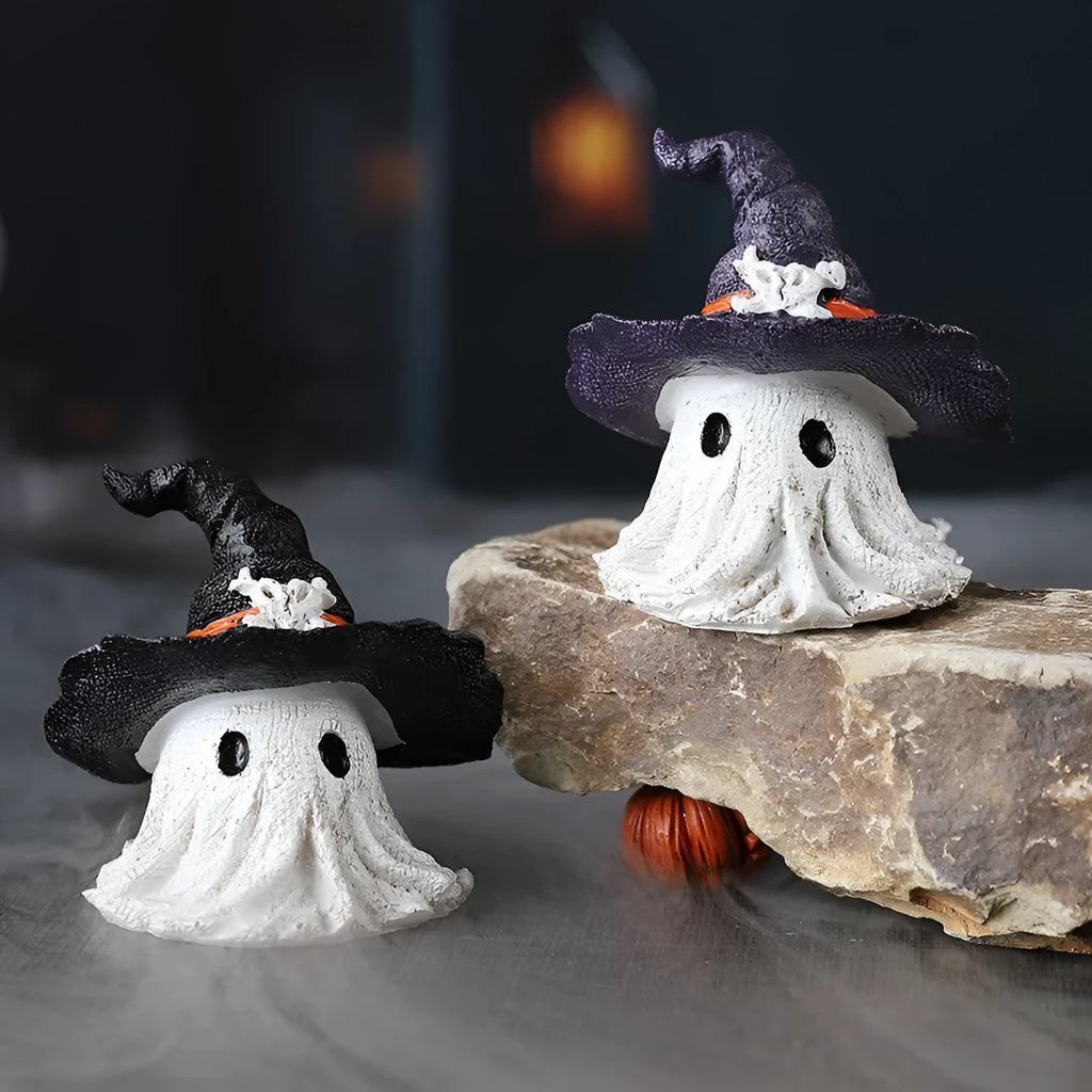 Black and purple resin wizard hat holiday ornament on a festive background.