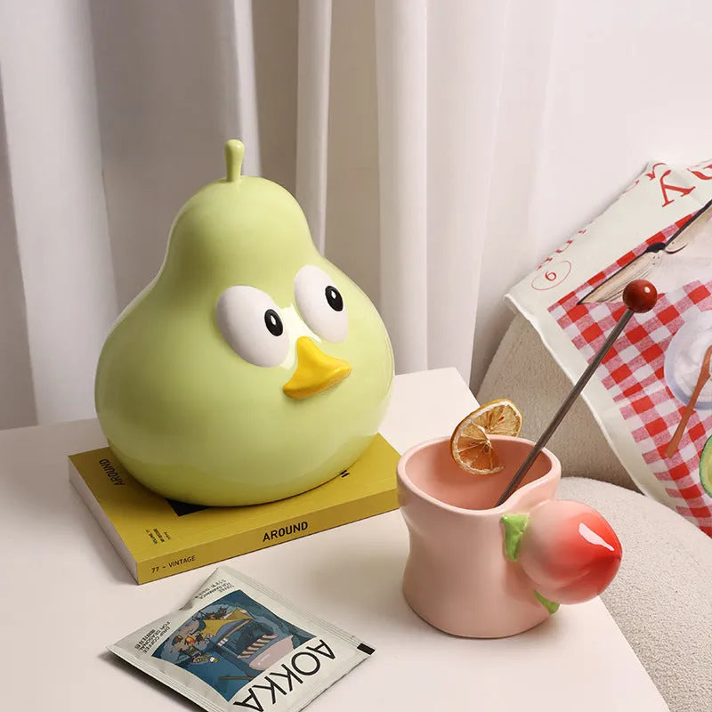 Green ceramic tissue box with cute pear design for living room or desktop.