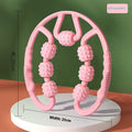 A handheld leg massage roller clip with multiple wheels, shown in a pink colour option.