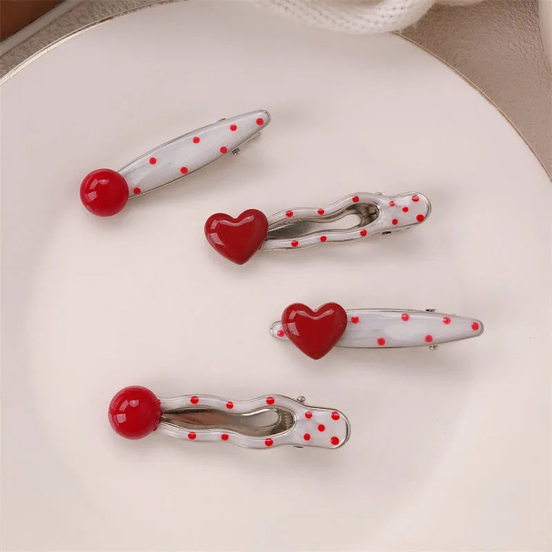 Red stereo love heart-shaped hairpin with French retro dots and willow leaf design