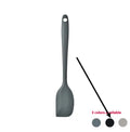 12-piece silicone kitchen utensil set in rotating storage bucket, including spatula, spoon, ladel, and egg beater on kitchen counter.