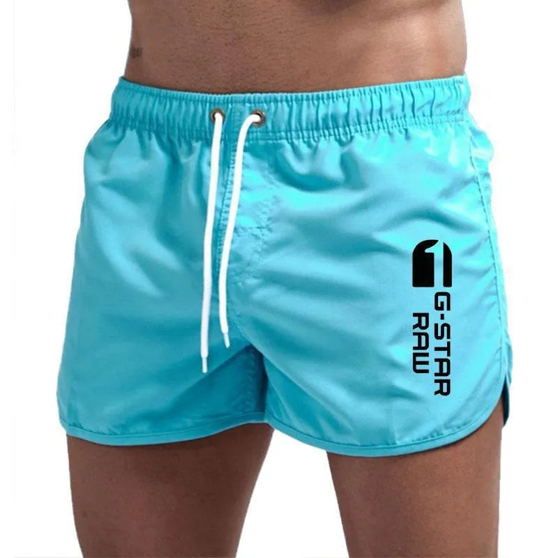 Men's sports beach shorts in 11 colour options including black, navy, and fluorescent green, polyester-hemp blend fabric