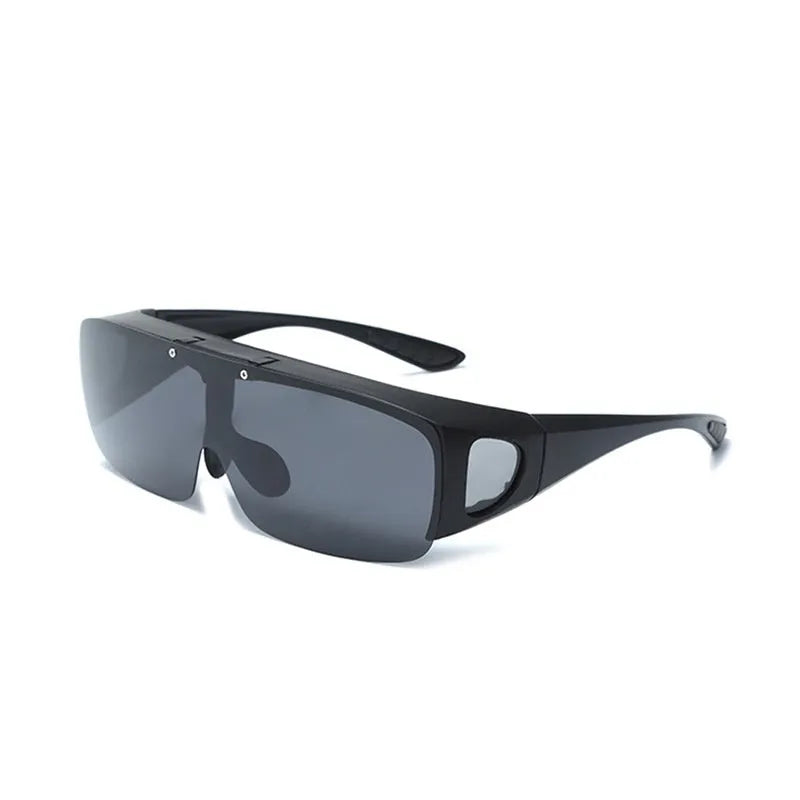 Polarised sports sunglasses with one-piece myopia correction lenses in a dark tint, suitable for cycling and climbing.
