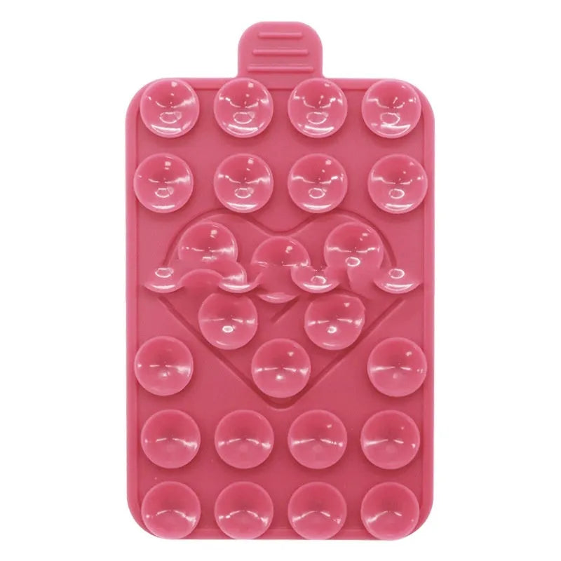 Double sided silicone suction cup phone case holder in gray white, showing hot pressed construction for universal fit on smooth surfaces