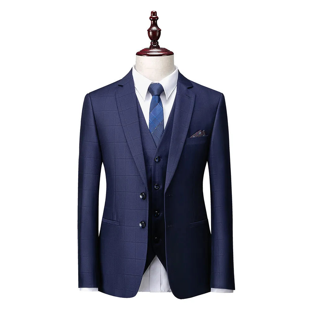 Men's navy blue plaid slim fit three-piece suit with jacket, vest and trousers on hanger