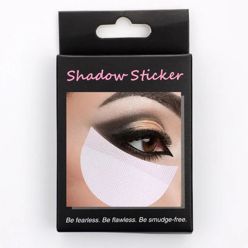 Pack of half-moon shaped disposable under-eye makeup shields on pink background
