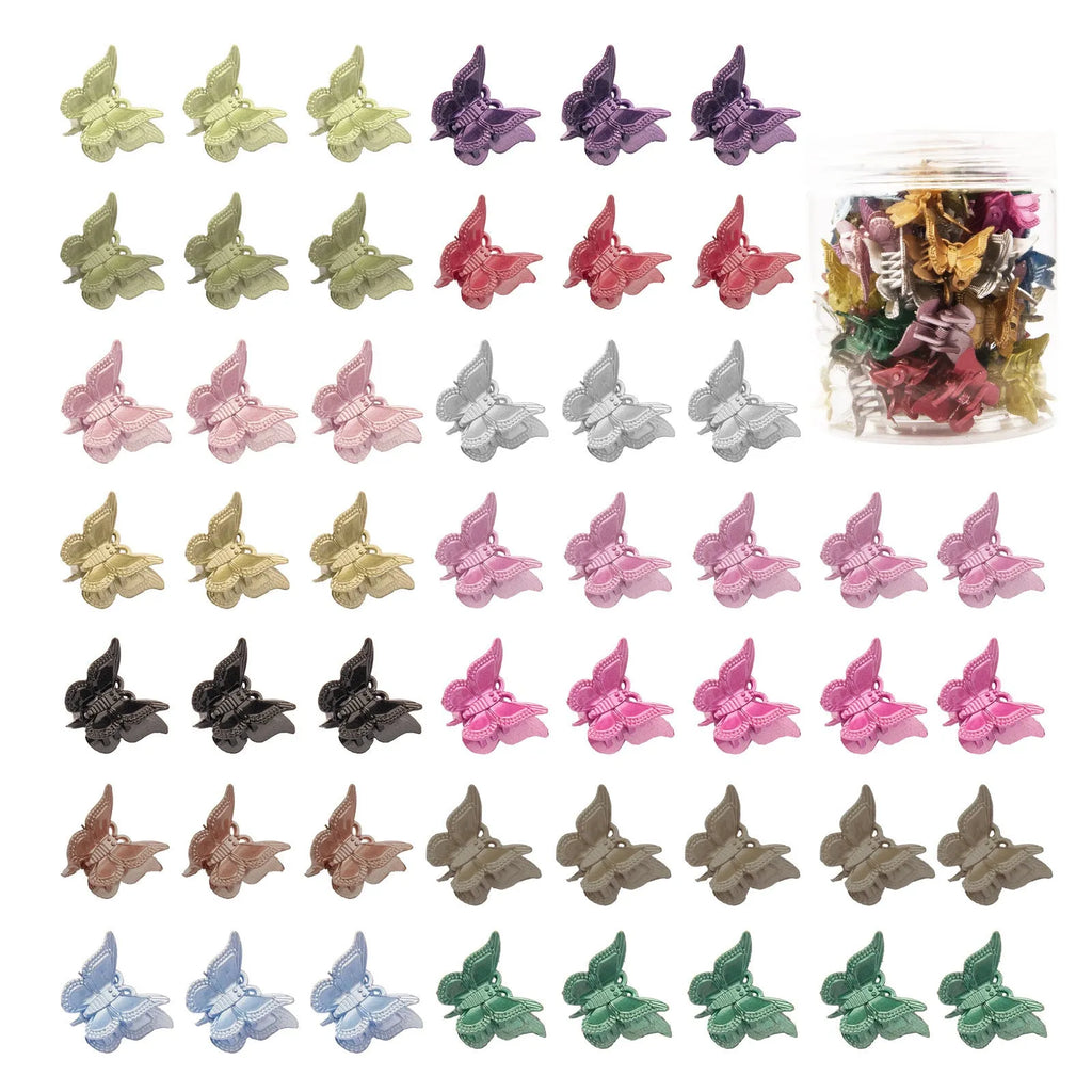 Set of glitter butterfly hair claw clips in assorted colours showing miniature size
