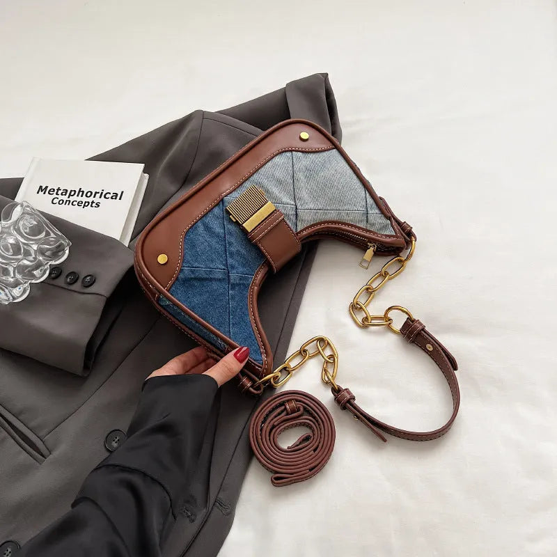Brown denim women's shoulder bag with diamond chain detail and bucket shape