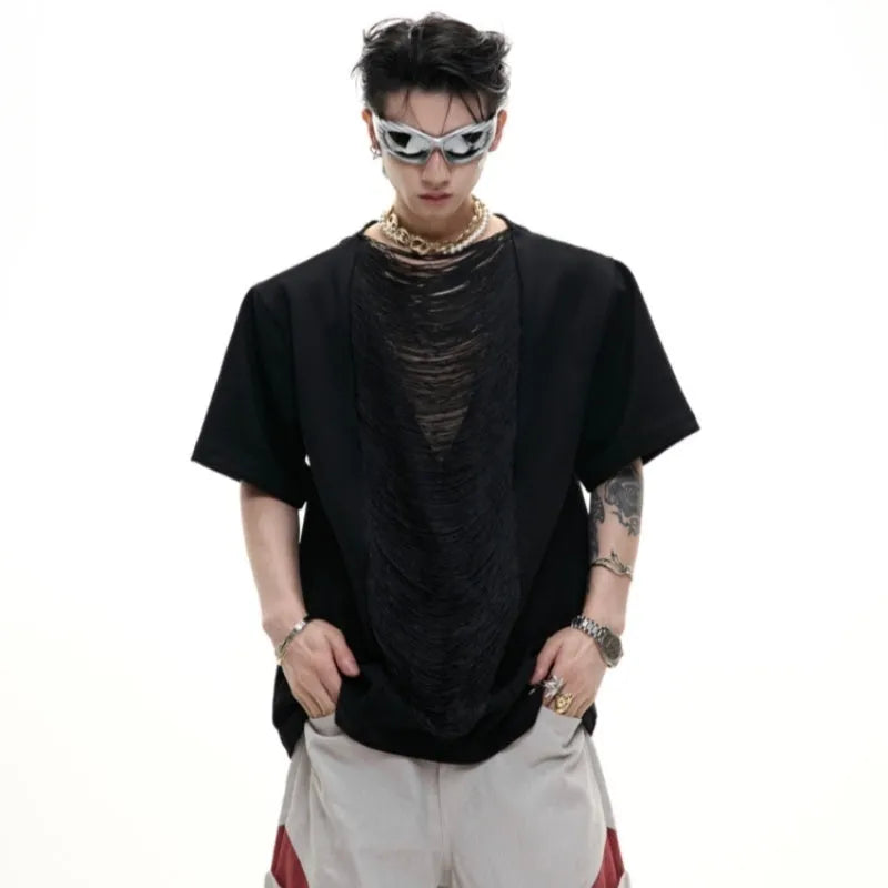 Man wearing a loose-fit drum black V-neck polyester T-shirt with short sleeves and a tassel detail.
