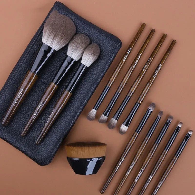12-piece makeup brush set with wooden handles in a grey PU zip case