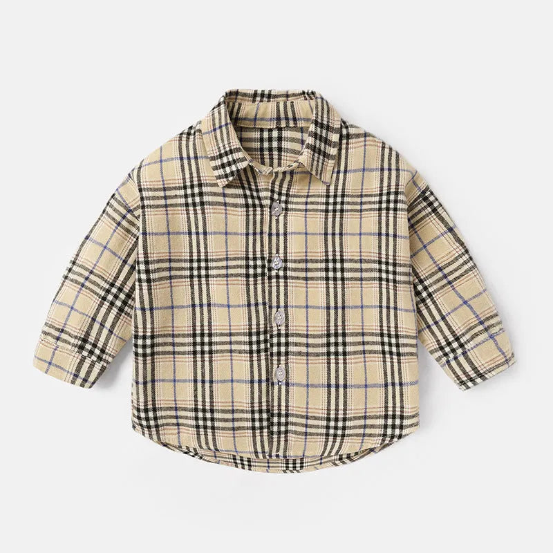 A boys' long sleeve cotton shirt with a lattice and cartoon pattern, shown in a light blue colour.