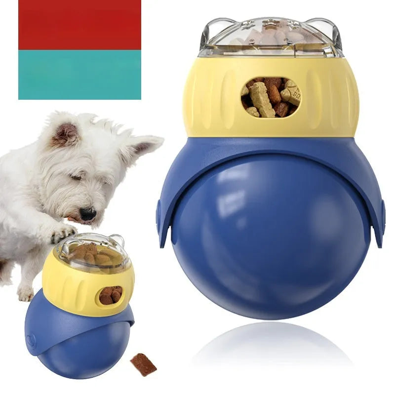 Owl-shaped yellow and blue plastic puzzle feeder for cats on a wooden floor.