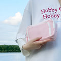 Double-layer high-capacity pencil case with carry handle in solid colour