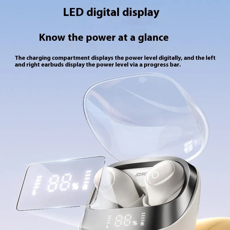 Beige wireless in-ear Bluetooth headphones and charging case on a table with a USB Type-C cable.