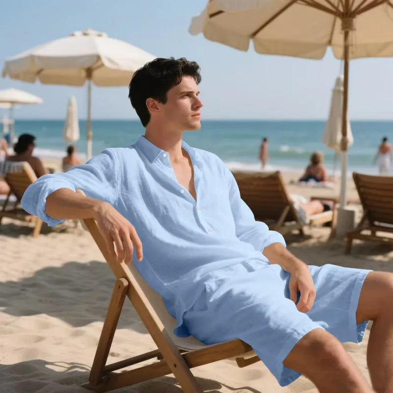 Men's linen beach suit showing long sleeve shirt and matching shorts in light blue colour