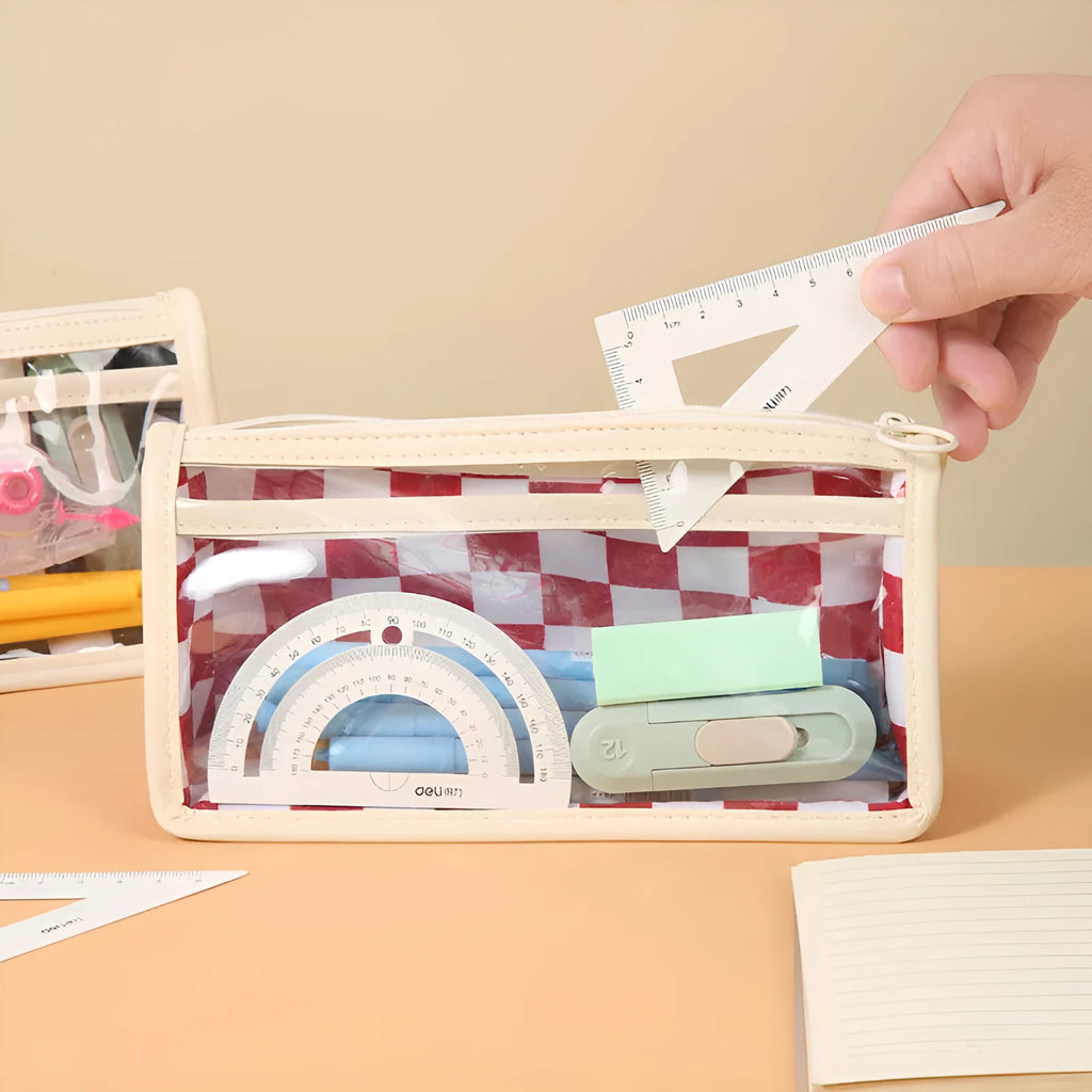 Clear PVC pencil case with black and white chessboard grid design, showing pens inside.