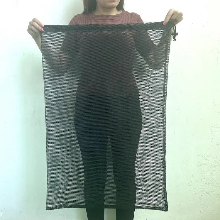 Black drawstring mesh storage bag for children's water balloons.