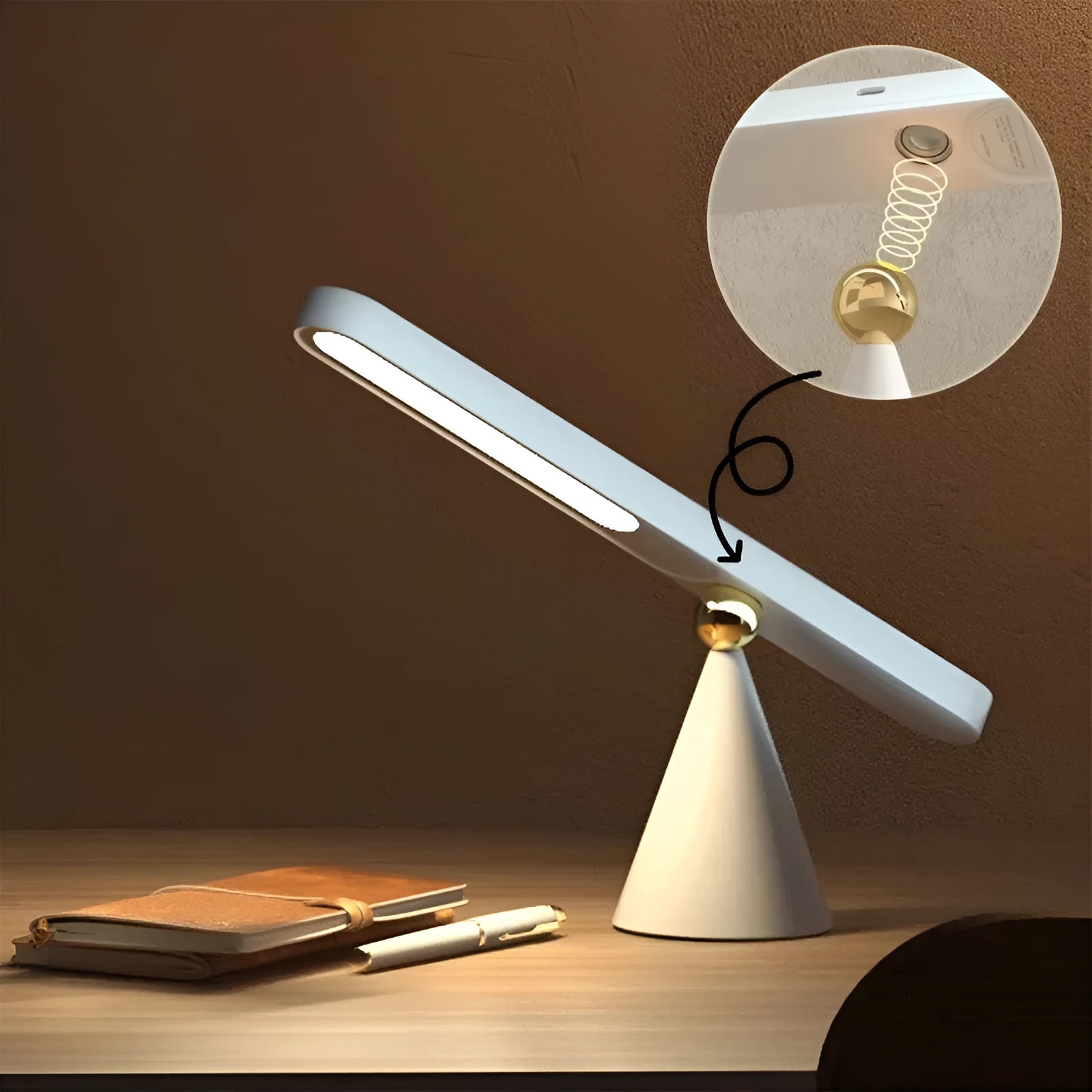 White geometric desk lamp with magnetic base mounted on a metal wall surface.
