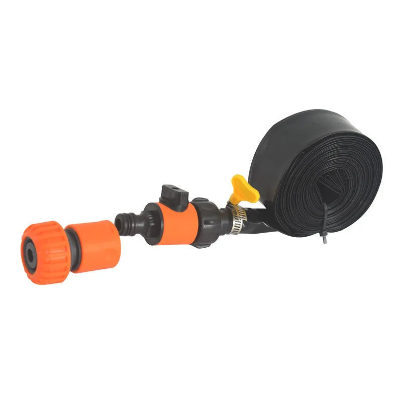 Blue and orange portable plastic garden sprinkler on a lawn with PVC switch.