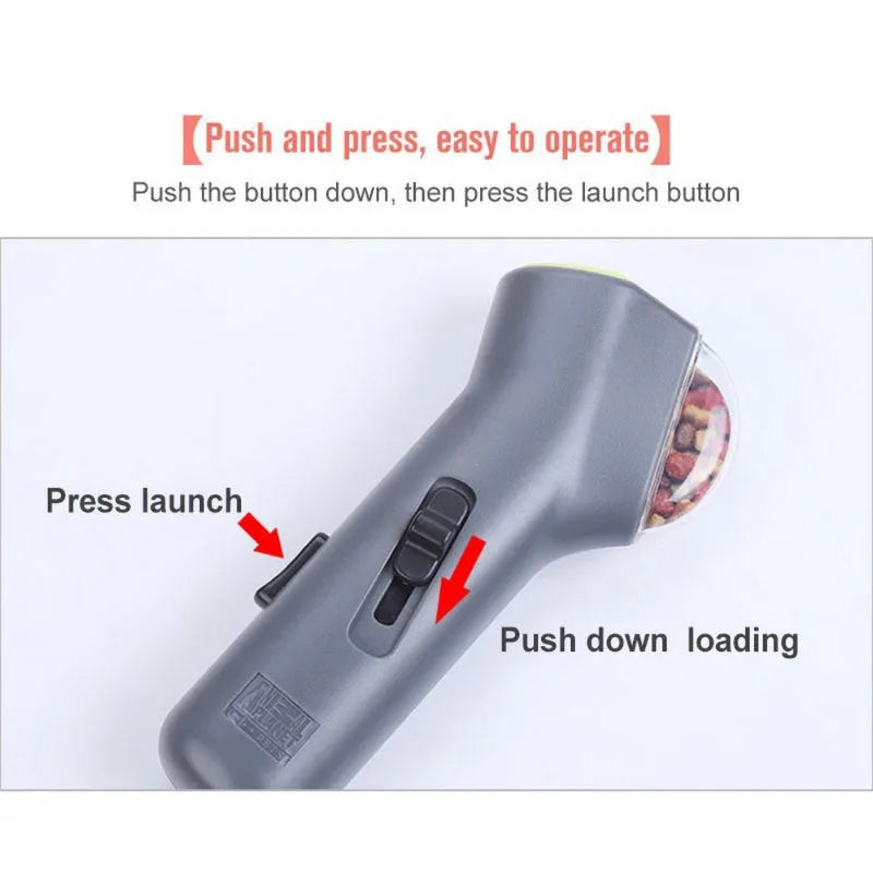 Grey pet snack launcher toy measuring 18cm with spring trigger for dog and cat training