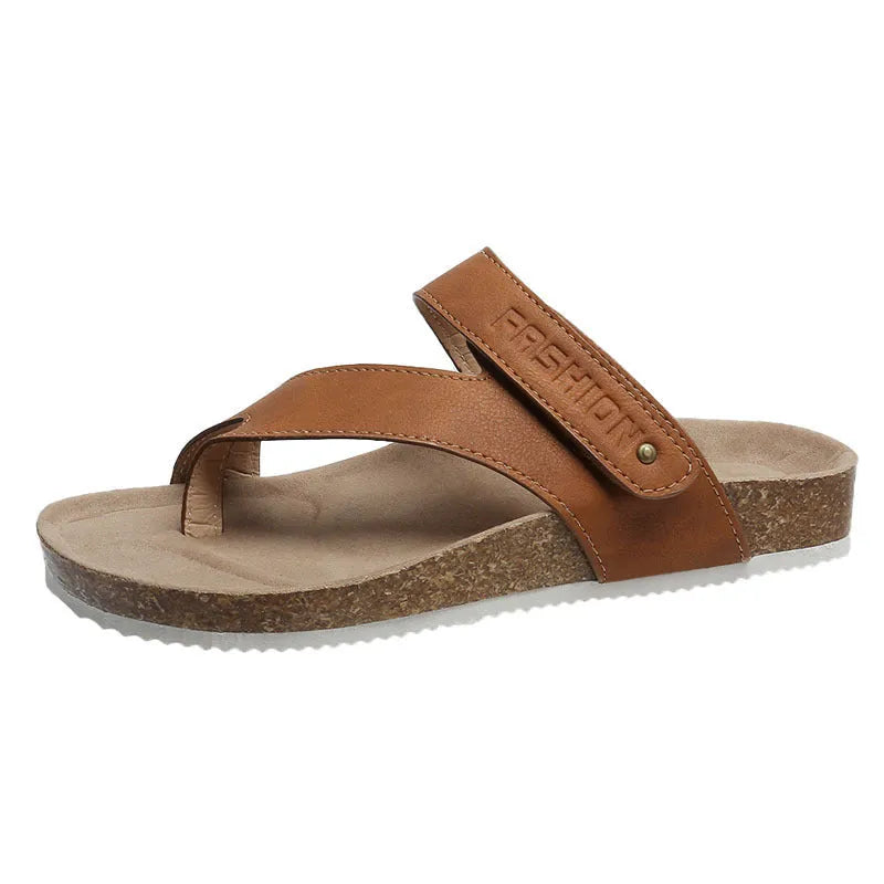 Blue thick-soled flat toe ring flip-flops on a white background.