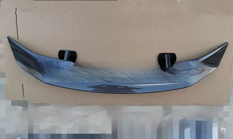 Universal punch-free car spoiler in ABS plastic shown in bright black finish.
