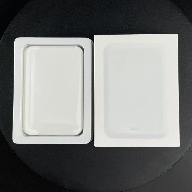 Portable magnetic wireless charger in white with 5000mAh capacity showing compact dimensions