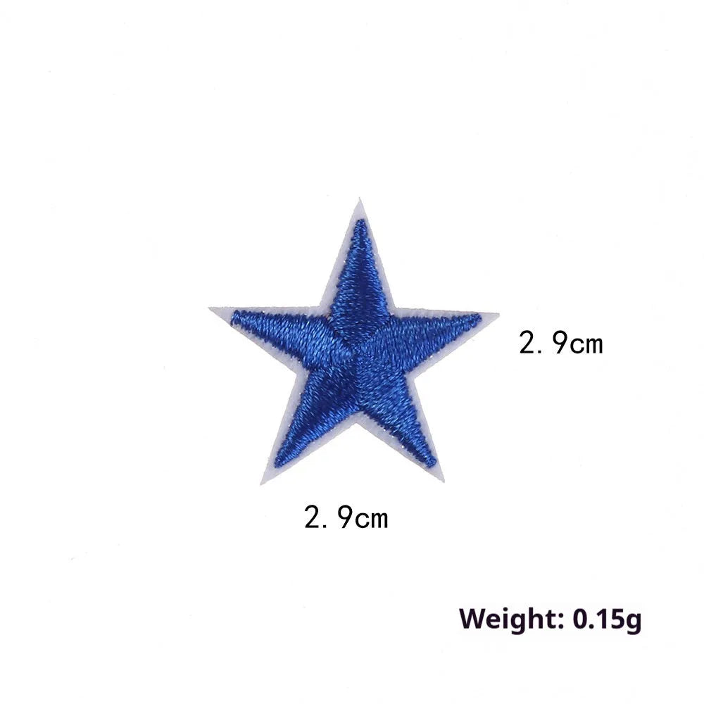 Colourful five-pointed star cloth embroidery stickers for DIY clothing decoration on a fabric background.