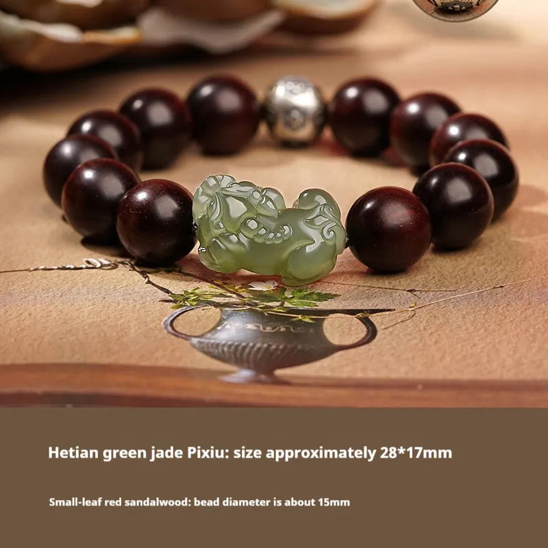 Close-up of a brown and black braided rope bracelet with a central Hetian jade bead on a wrist.