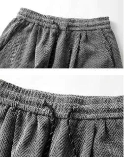Man's straight-leg fleece-lined casual trousers in lightweight grey fabric with an elastic waistband.