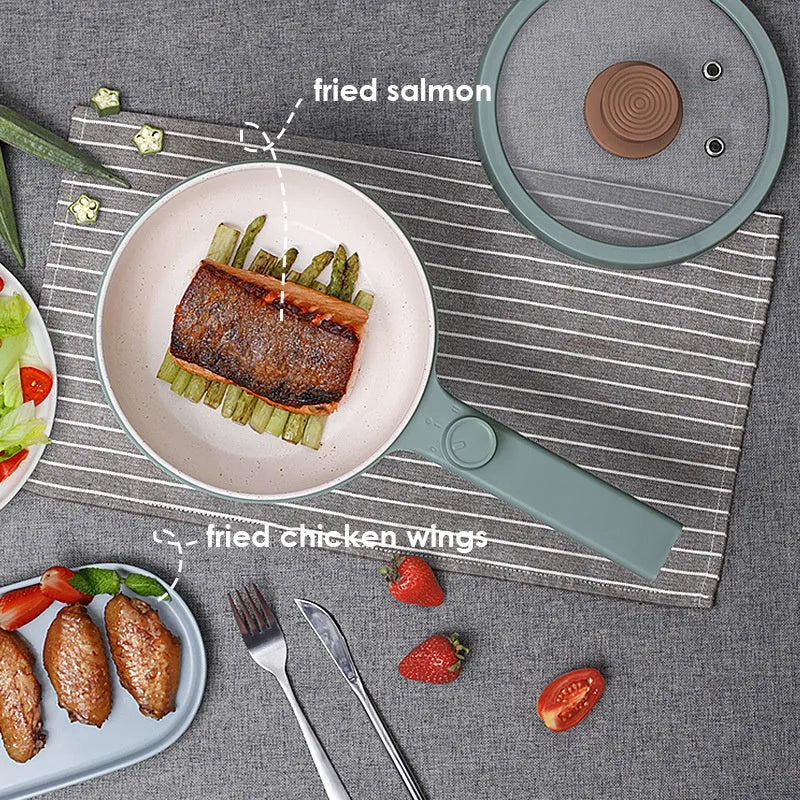 White mini electric cooking pot with 600W power and multiple cooking functions including boiling, steaming and frying
