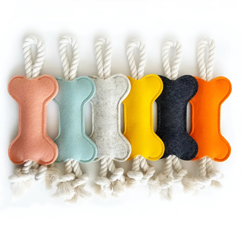 Felt bone shaped dog toy with rope knots in blue colour showing dimensions