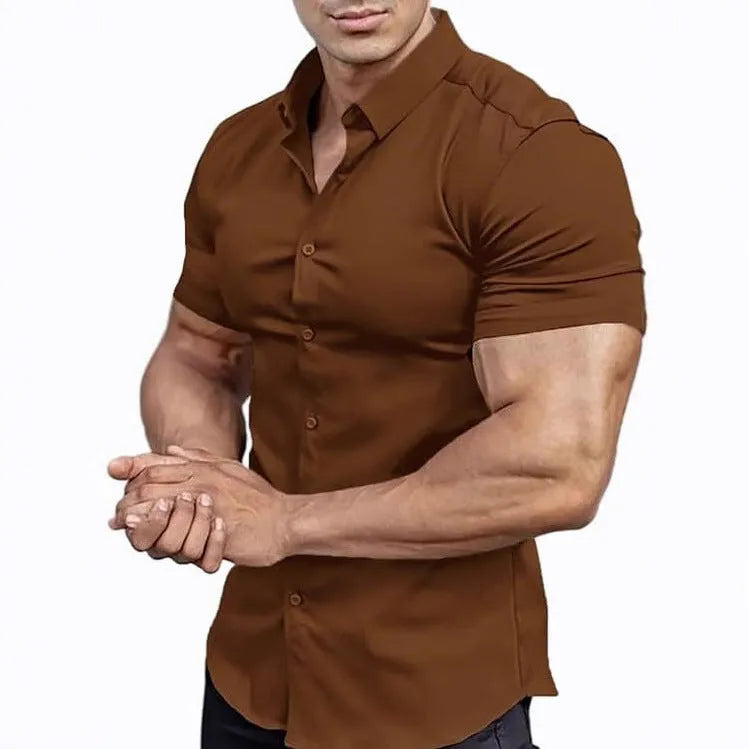 Man wearing a brown short sleeve printed casual shirt with a collar.