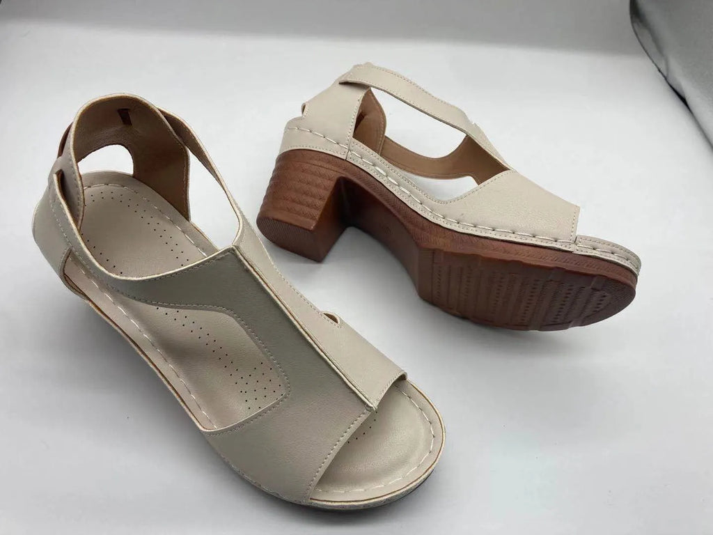 Women's peep toe wedge sandal with buckle on low heel, open fish mouth toe, in light brown