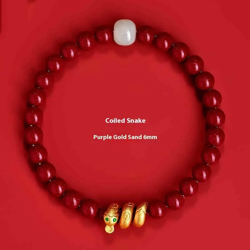 Handmade Chinese-style snake zodiac bracelet made from cinnabar beads.