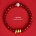 Handmade Chinese-style snake zodiac bracelet made from cinnabar beads.