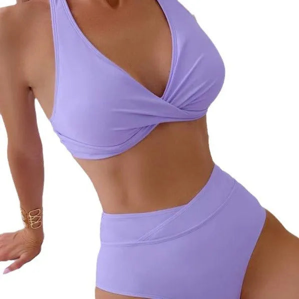 Women's high-waisted floral print swimsuit briefs in peacock green colour.