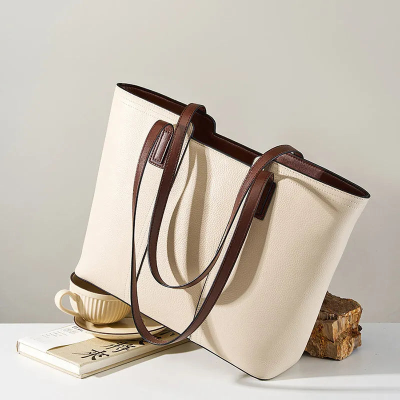 Women's genuine leather commuter bag with internal organisation compartments in horizontal square design
