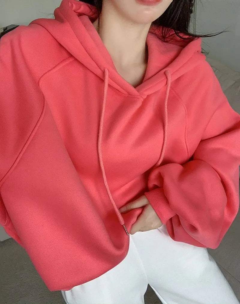 Watermelon red women's sleeveless hooded sweater made from mulberry silk fabric.