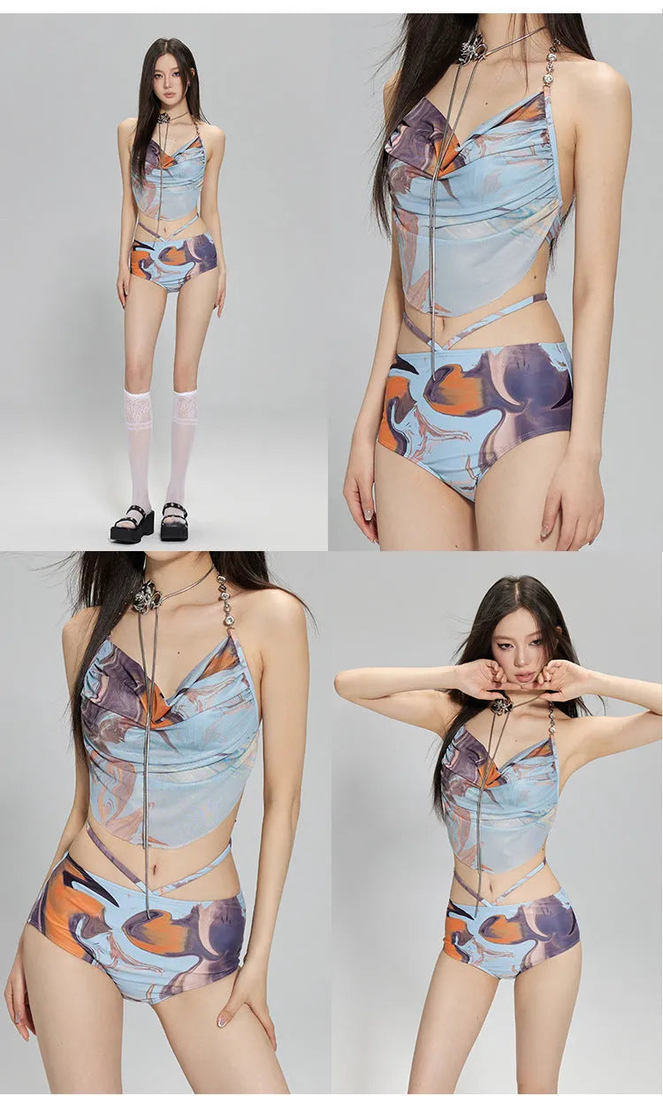 Women's blue printed three-piece bikini set with triangle top featuring steel wire support and a detachable skirt.