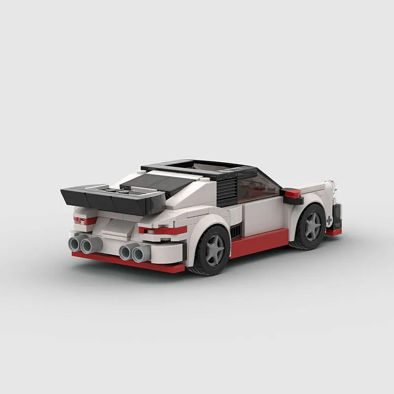 Small particle plastic building block set assembled into a sports car moc puzzle cool convertible car model showing the M10231 colour option