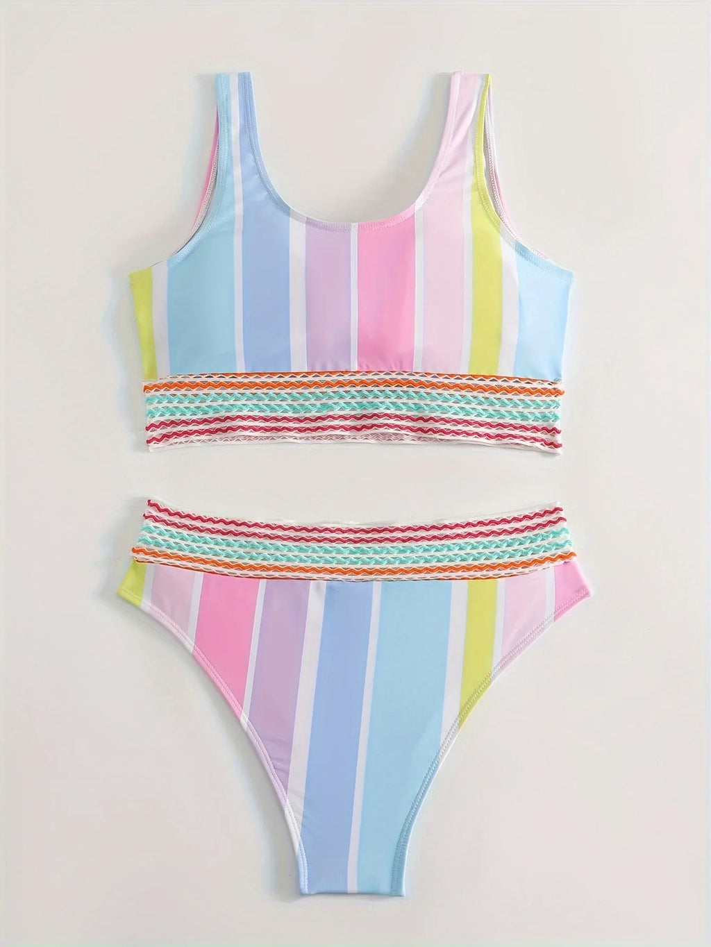 Women's striped two-piece bikini on a hanger, showing sporty briefs with spandex lining and matching top.