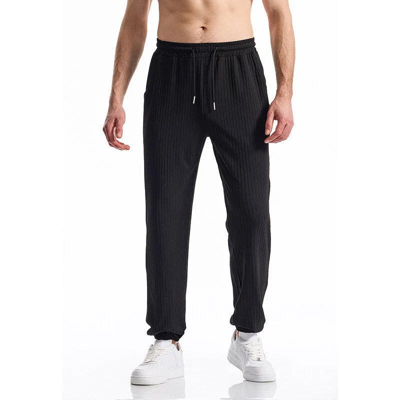 Silky rib fabric casual trousers with baggy straight-leg cut and elastic waistband