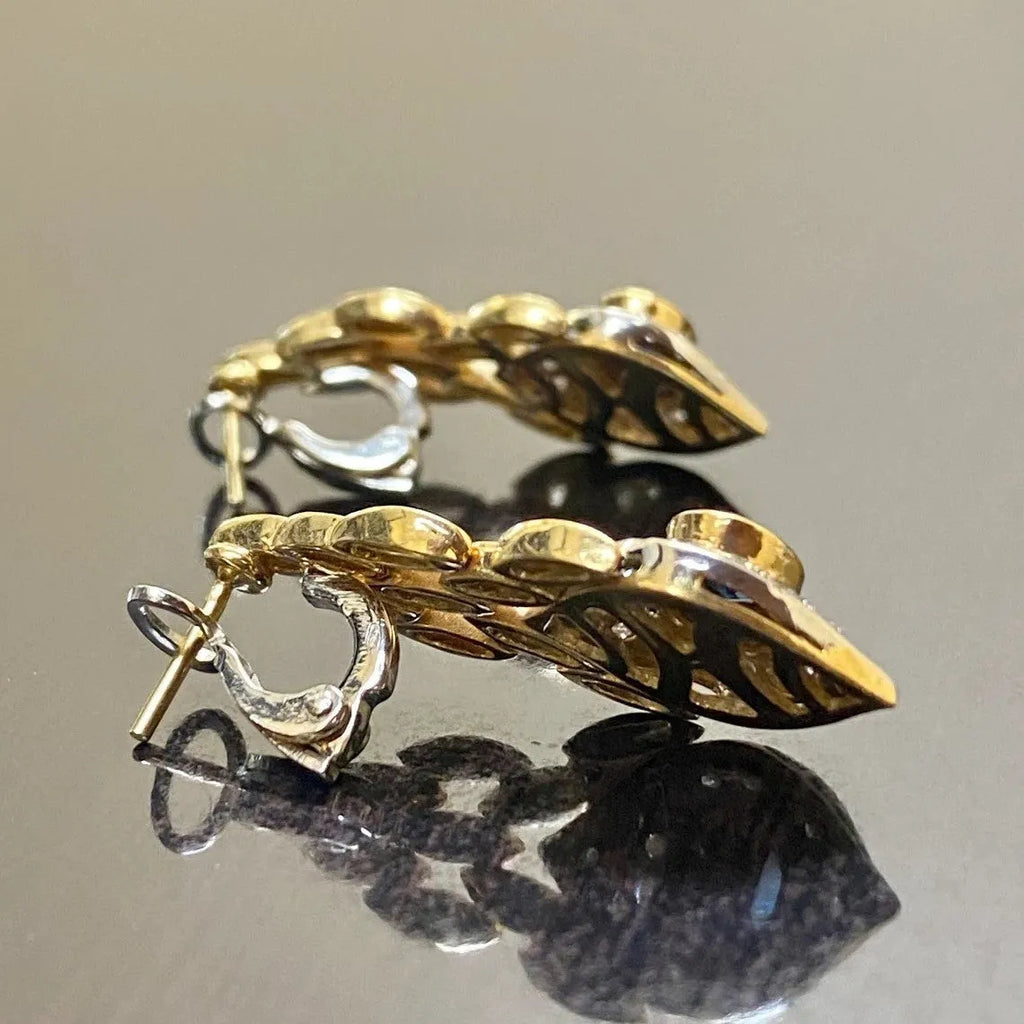 Pair of women's snake motif drop earrings in imitation gold with electroplated alloy finish
