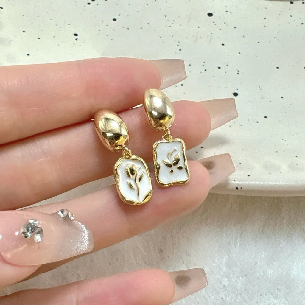 Asymmetric S925 silver needle ear stud with geometric floral electroplated alloy finish for women