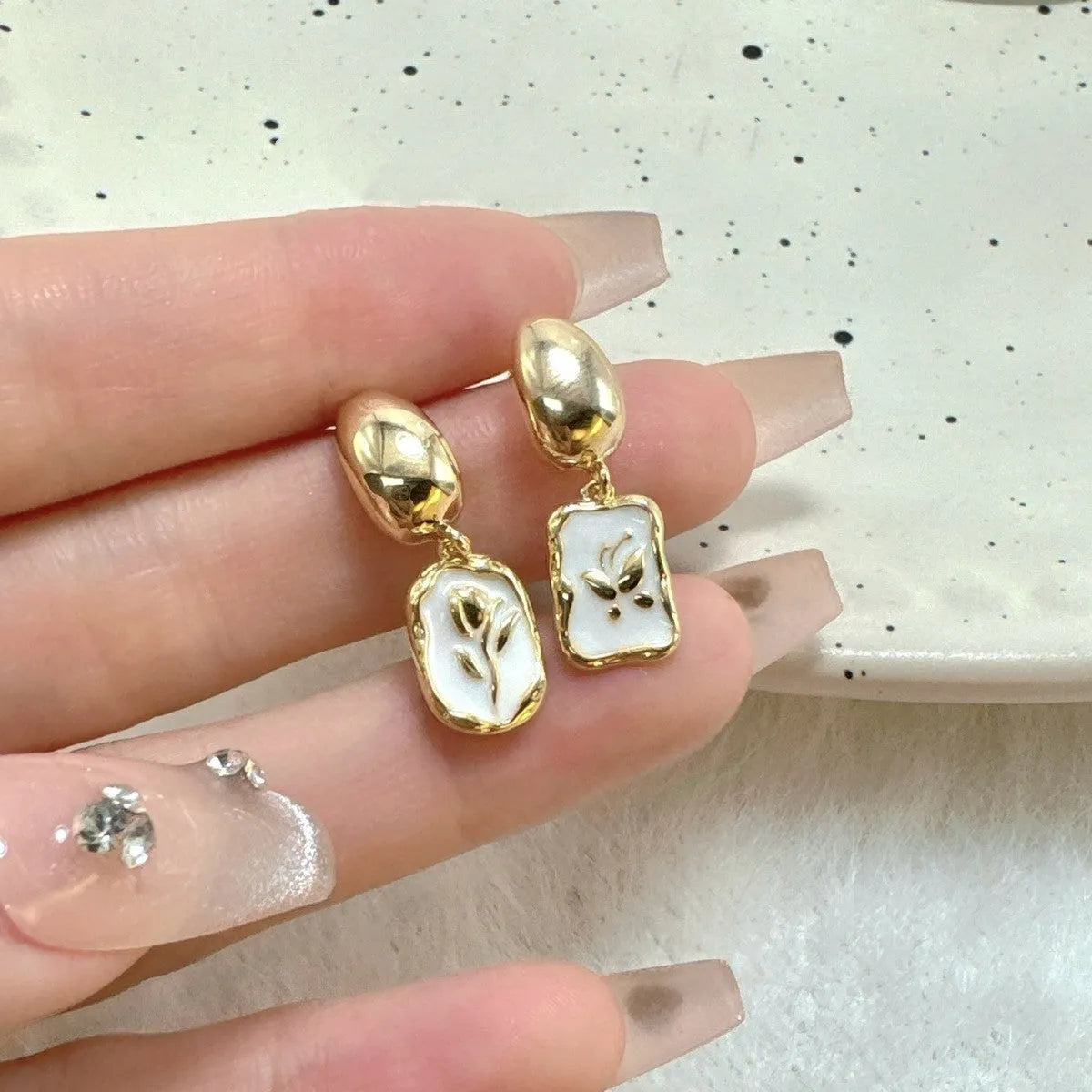 Asymmetric S925 silver needle ear stud with geometric floral electroplated alloy finish for women