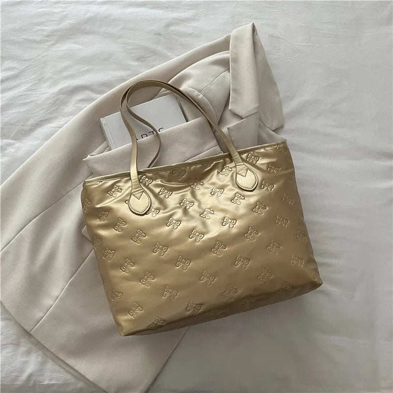 French retro simple embossed PU shoulder bag in black horizontal square shape with double shoulder straps and sewing line detail