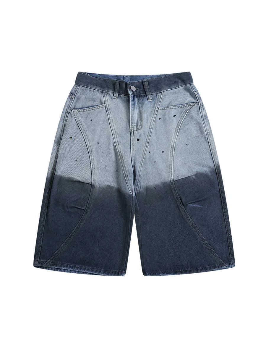 Blue tie-dye gradient washed-out cropped jeans with a loose fit and mid-waist, laid flat